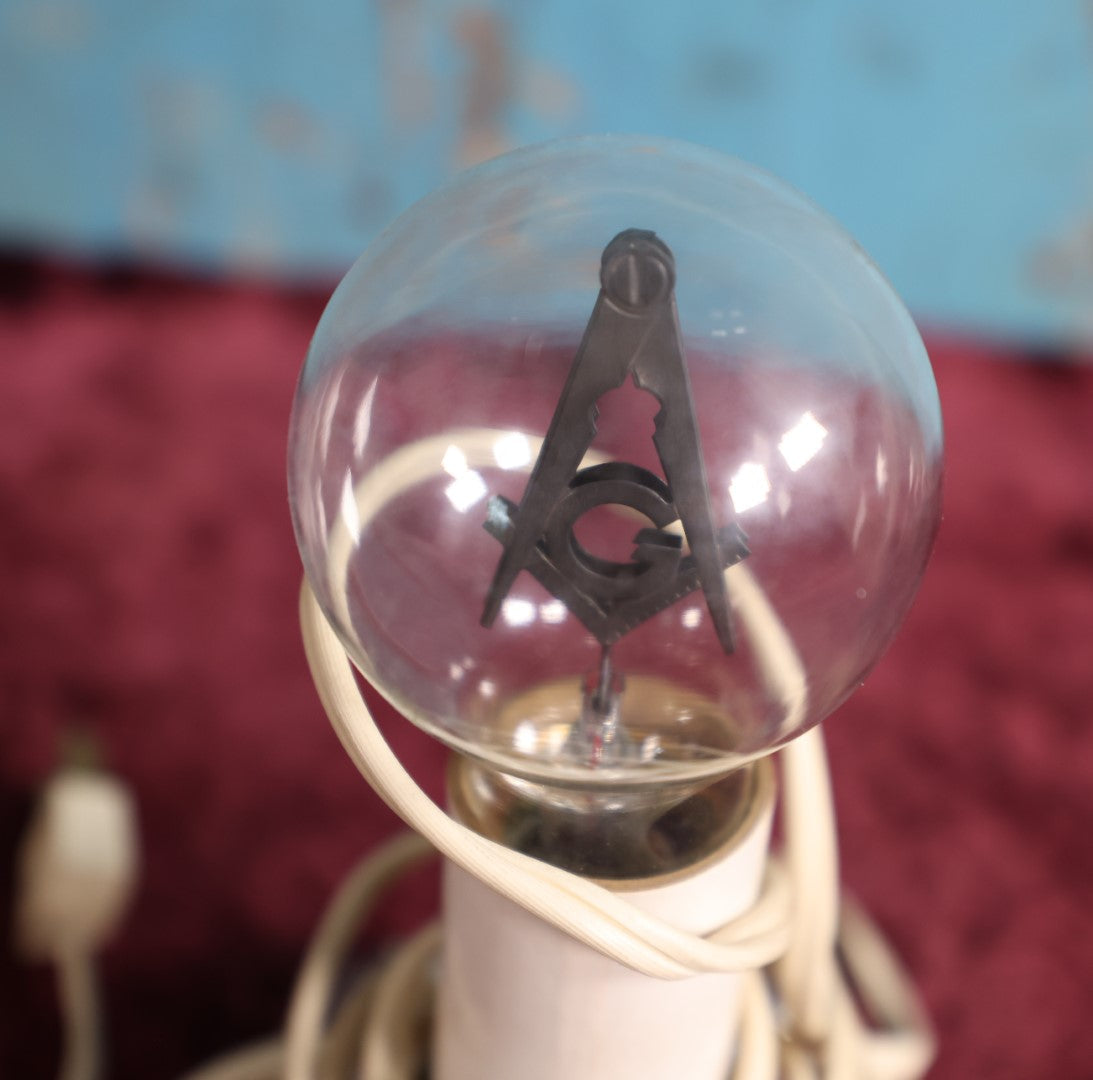 Lot 056 - Lamp Base With Antique Aerolux Freemasons Masonic Compass And Square Glowing Lightbulb, Working