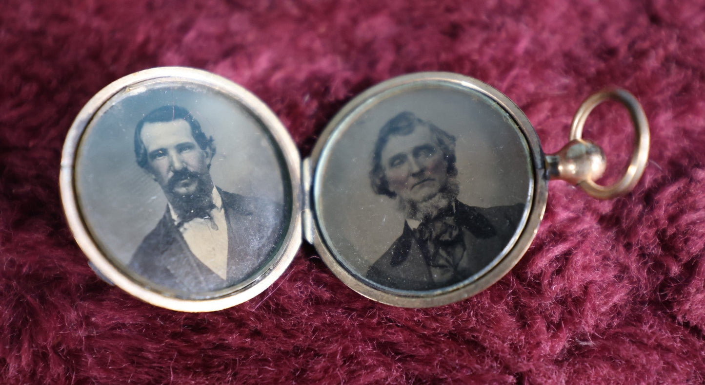 Lot 059 - Antique Gold Toned Locket With Pair Of Tintype Photos, Two Men