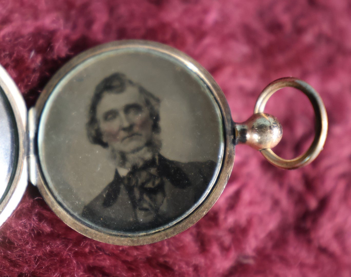 Lot 059 - Antique Gold Toned Locket With Pair Of Tintype Photos, Two Men