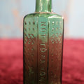 Lot 076 - Antique Not To Be Taken Green Glass Poison Bottle, 2 Oz