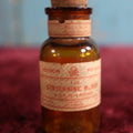Lot 077 - Vintage Merck Strychnine Poison Bottle With Two Paper Labels, Cork