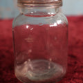 Lot 081 - Antique Bowker's Pyrox Small Clear Glass Poison Jar With Lid