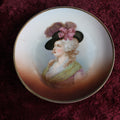 Lot 085 - Antique Plate With Woman In Hat, Has Wire Hanger