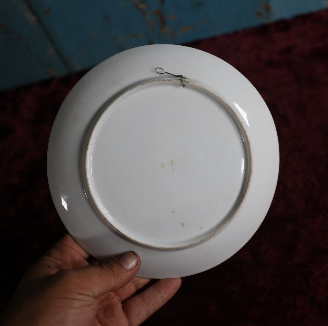 Lot 085 - Antique Plate With Woman In Hat, Has Wire Hanger