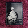 Lot 095 - Tintype Of Baby Standing On Chair