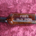 Lot 127 - Finns Hair Tonic Amber Glass Bottle