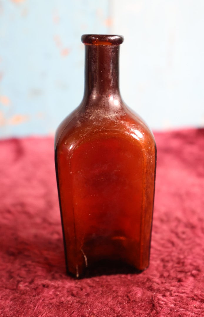 Lot 127 - Finns Hair Tonic Amber Glass Bottle