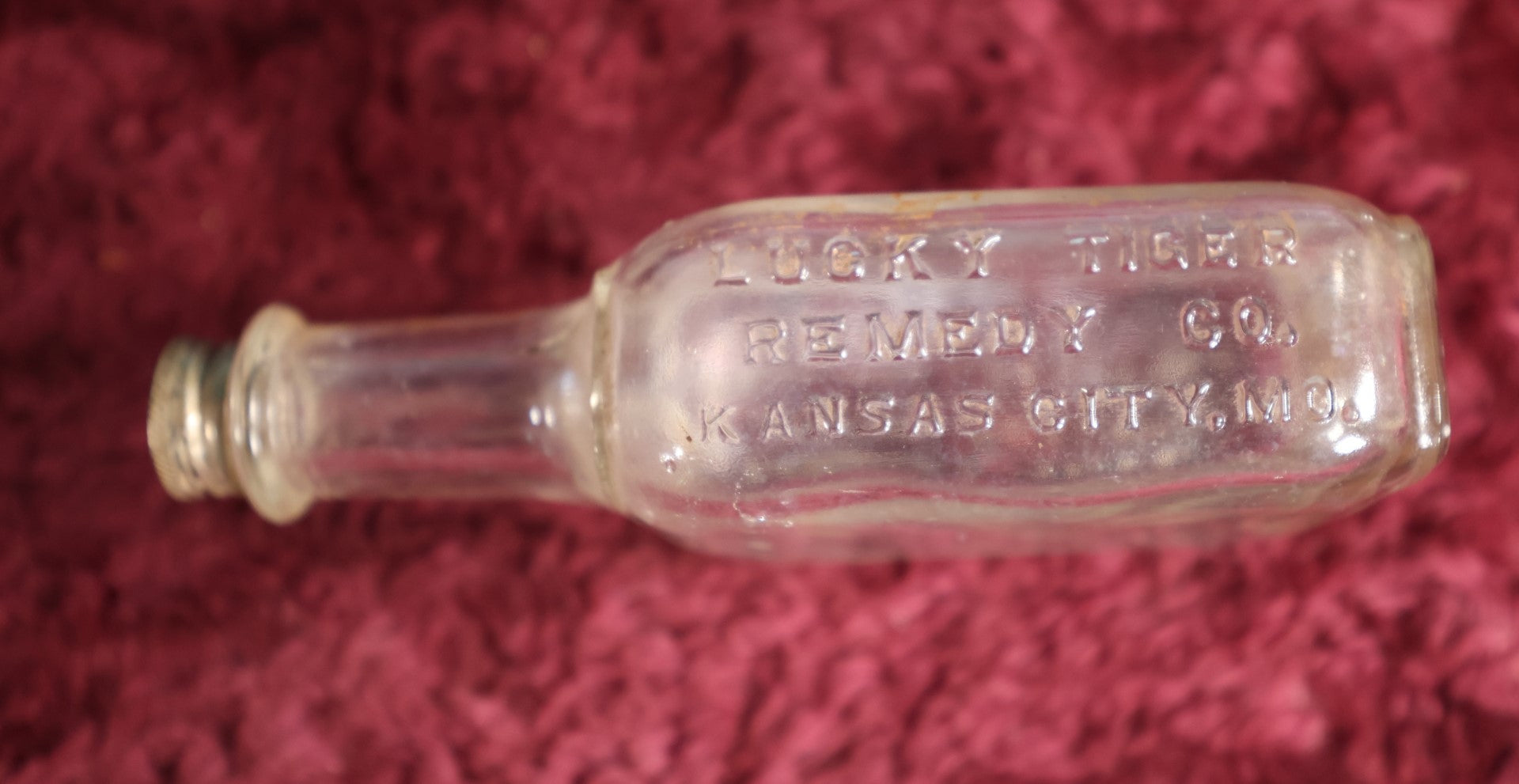 Lot 130 - Lucky Tiger Remedy Co. Antique Glass Bottle, Kansas City, Missouri