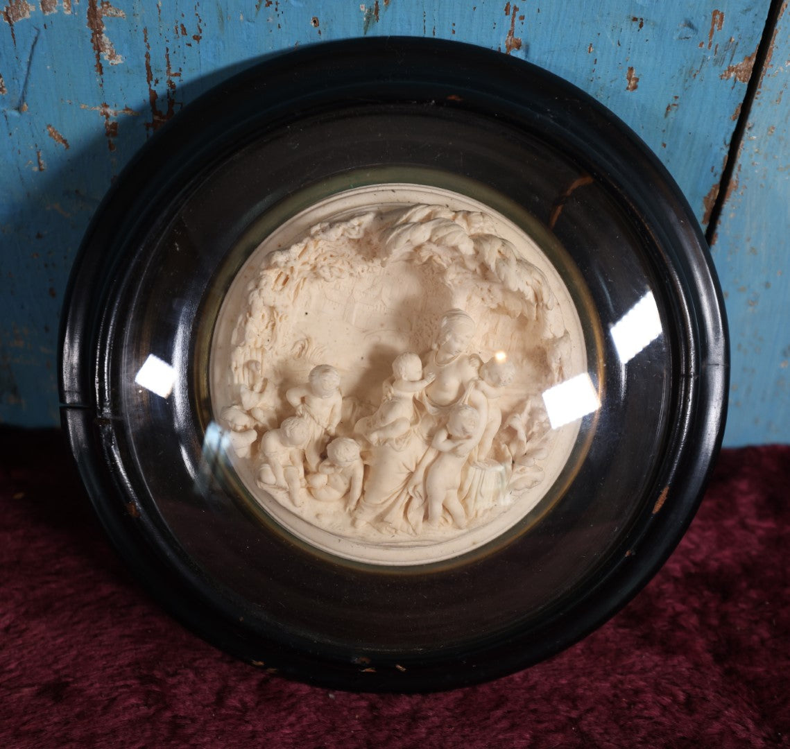 Lot 011 - 19Th Century French Meerschaum Carving In Black Frame With Bubble Glass, Woman Breastfeeding, Surrounded By Children, Damage To Frame