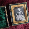 Lot 159 - 1/9Th Plate Daguerreotype Of Baby Girl With Blonde Hair, Dress, Split Leatherette Union Case With Green Pillow