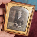Lot 160 - Quarter Plate Daguerreotype Of Pretty Young Woman In Dress, Book On Table, Nice Half Leatherette Case With Floral Design