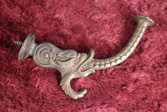 Lot 014 - Antique Cast Metal Hook With Screw, Wolf Or Dolphin Motif, Single