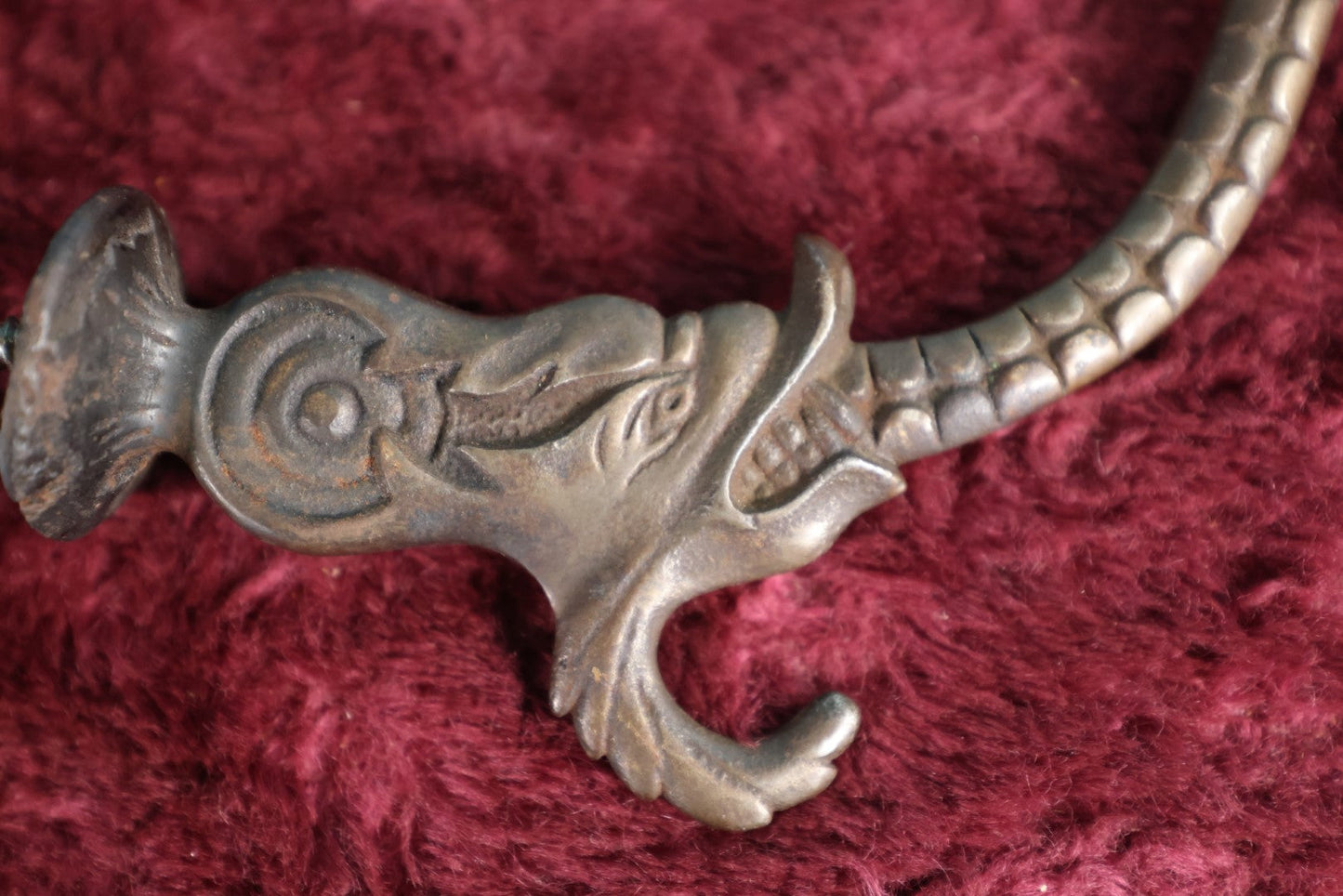 Lot 014 - Antique Cast Metal Hook With Screw, Wolf Or Dolphin Motif, Single