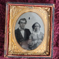Lot 162 - 1/9Th Plate Tintype Of Couple In Half Leatherette Case, Woman Holding Book