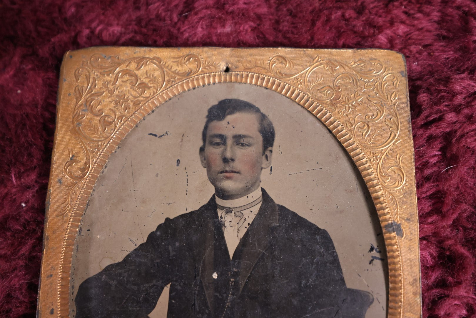 Lot 163 - Quarter Plate Tintype Of Man With Brass Mat, Tinted Lips, Young Adult