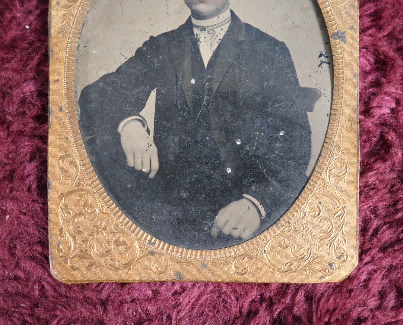 Lot 163 - Quarter Plate Tintype Of Man With Brass Mat, Tinted Lips, Young Adult