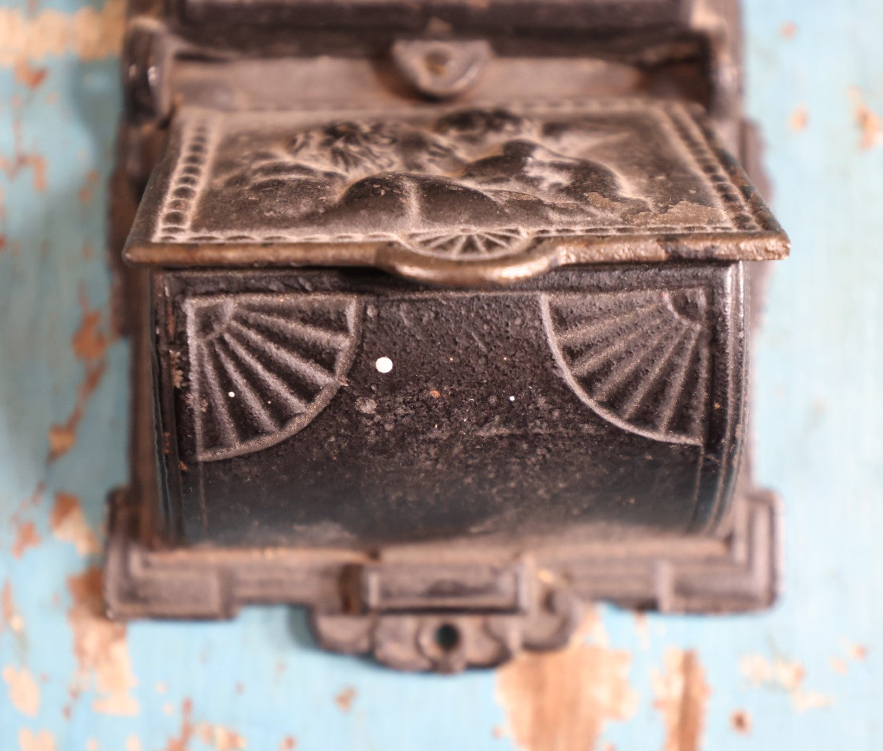 Lot 015 - Antique Venus And Cupid Cast Iron Match Box With Hinged Lid, Match Strike, Marked V.M. Co.