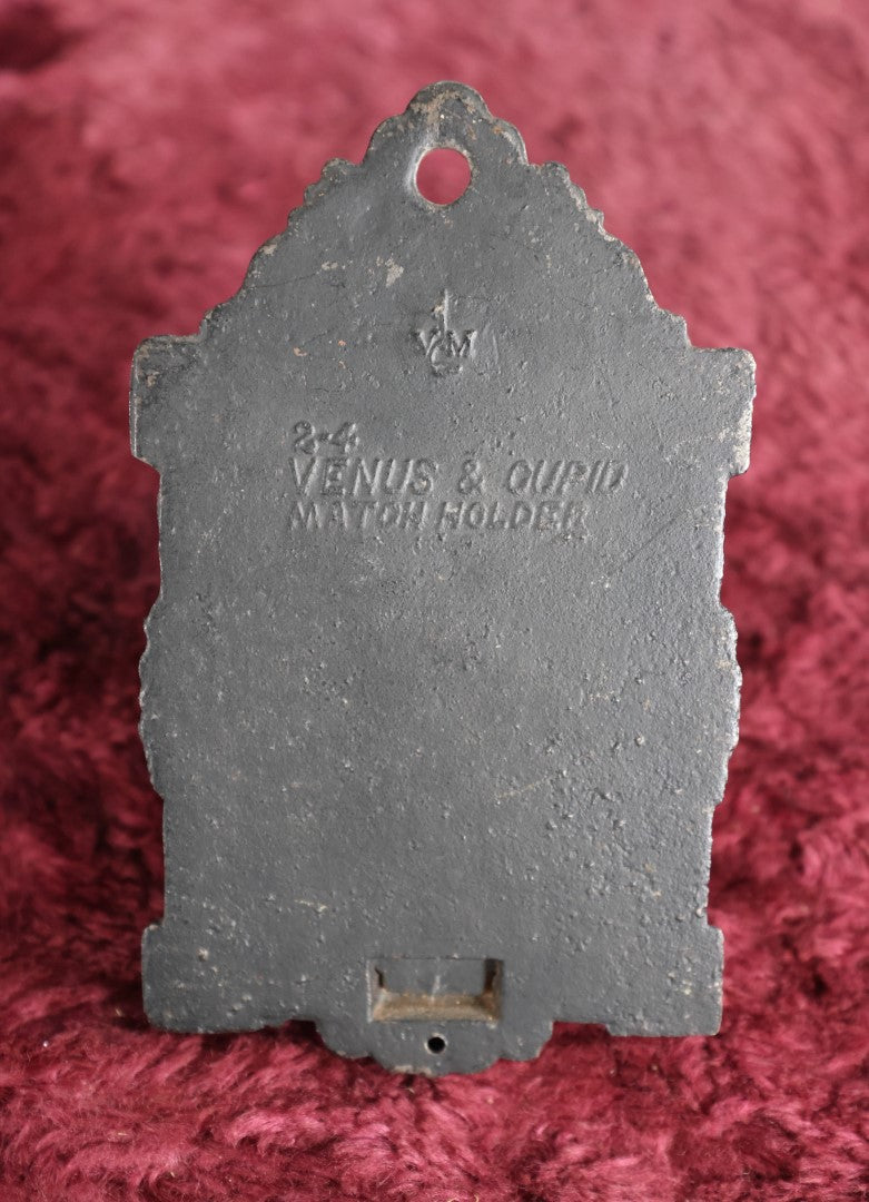 Lot 015 - Antique Venus And Cupid Cast Iron Match Box With Hinged Lid, Match Strike, Marked V.M. Co.