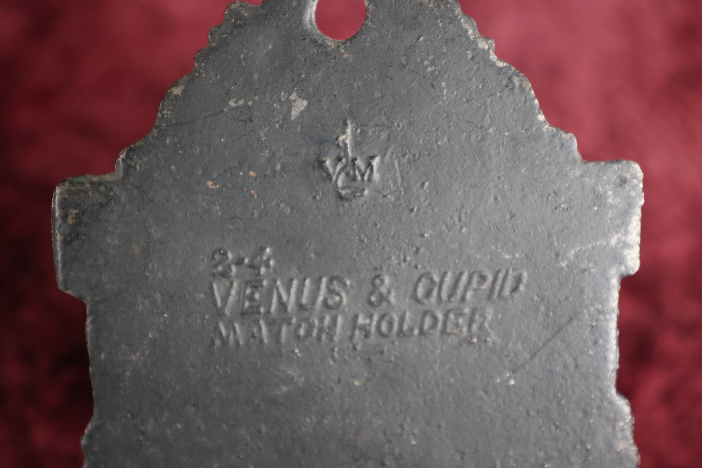 Lot 015 - Antique Venus And Cupid Cast Iron Match Box With Hinged Lid, Match Strike, Marked V.M. Co.