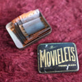 Lot 054 - Anitque Movielets Tin With Silent Movie Film Strip Cells, Early Cinema
