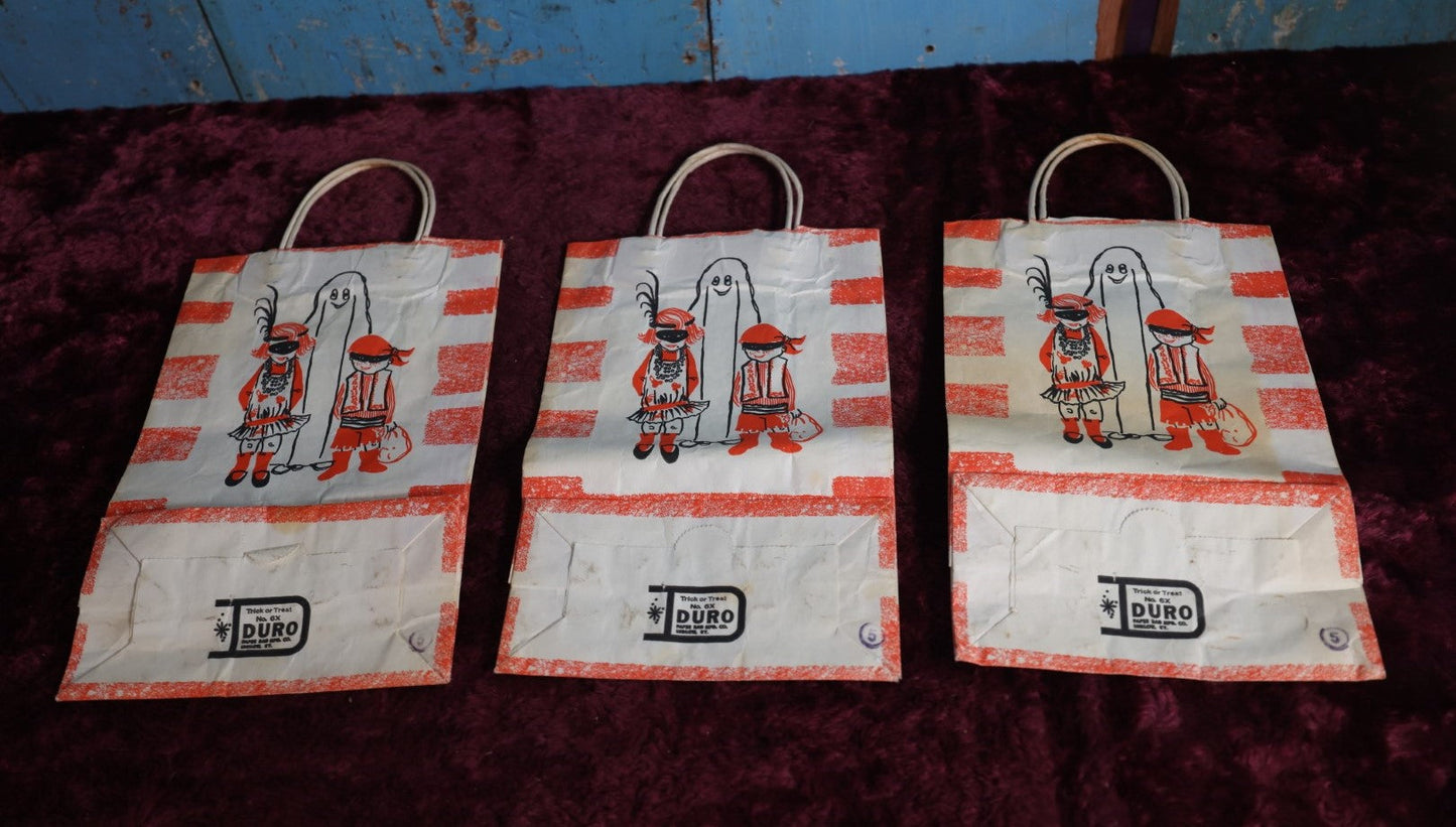 Lot 055 - Grouping Of Three Vintage Halloween Trick Or Treat Bags By Duro, Various Markings And Wear, Sold As Lot