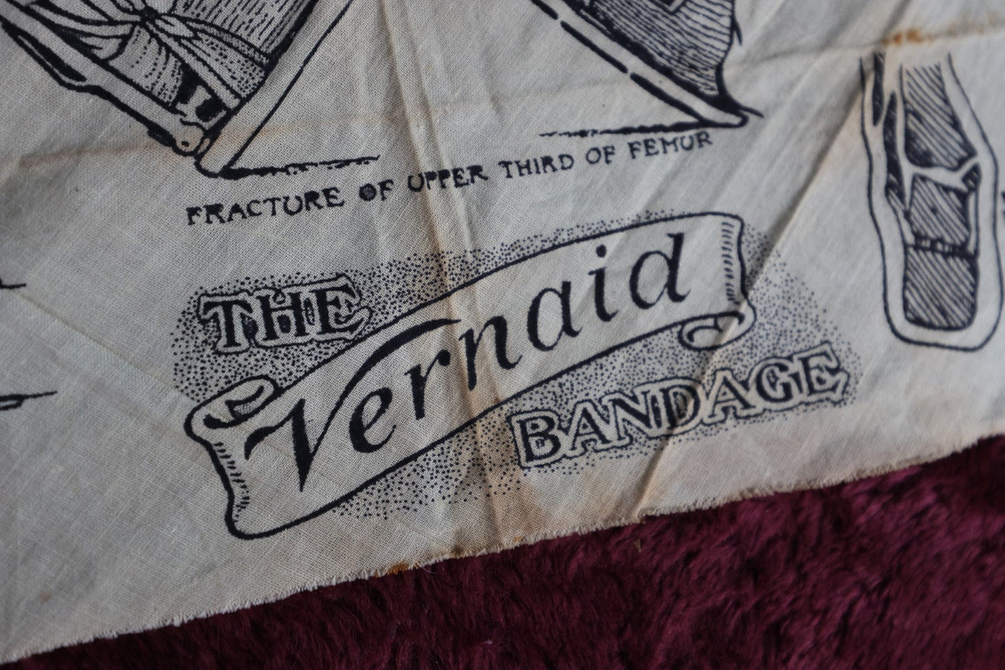 Lot 056 - Antique Vernaid Bandage, First Aid Handkerchief Sling Showing Different Uses, Design № 720438 Approved By Sir James Cantlie K.B.E. Fr.C.S