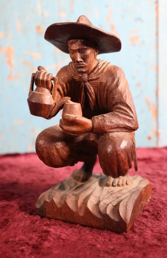 Lot 063 - Folk Art Carved Wooden Cowboy Statue, Pouring Tea Or Coffee, Artist Signed, W. Weiss.