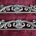 Lot 069 - Pair Of Antique Cast Metal Ornamental Hardware Pieces