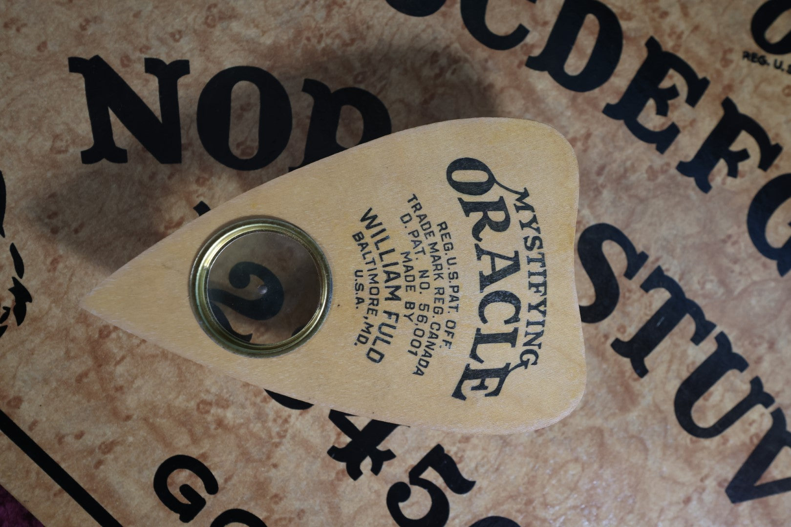 Lot 001 - William Fuld "Mystifying Oracle" Ouija Board With Box And Original Planchette, Patent No. 114,534, Circa 1939