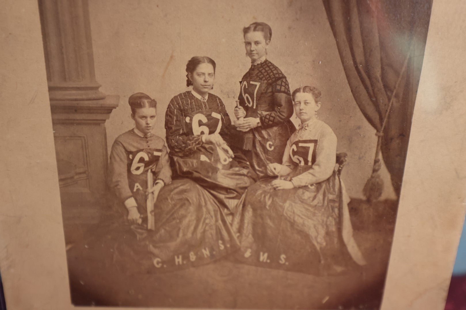 Lot 010 - Antique Group Photo Of Women With "67" On Their Clothes, Likely 1867, Possible Sorrority, High School, Etc., Marked C.H. & N.S.