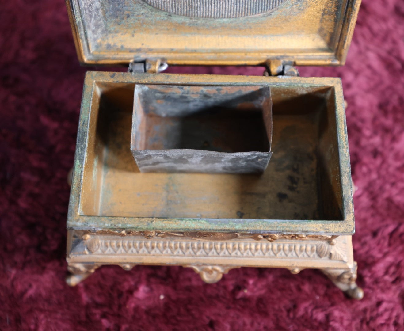 Lot 031 - Antique Pot Metal Match Safe With Cupid Motif, Ornate With Match Strike And Small Box On The Inside, Feet, Etc