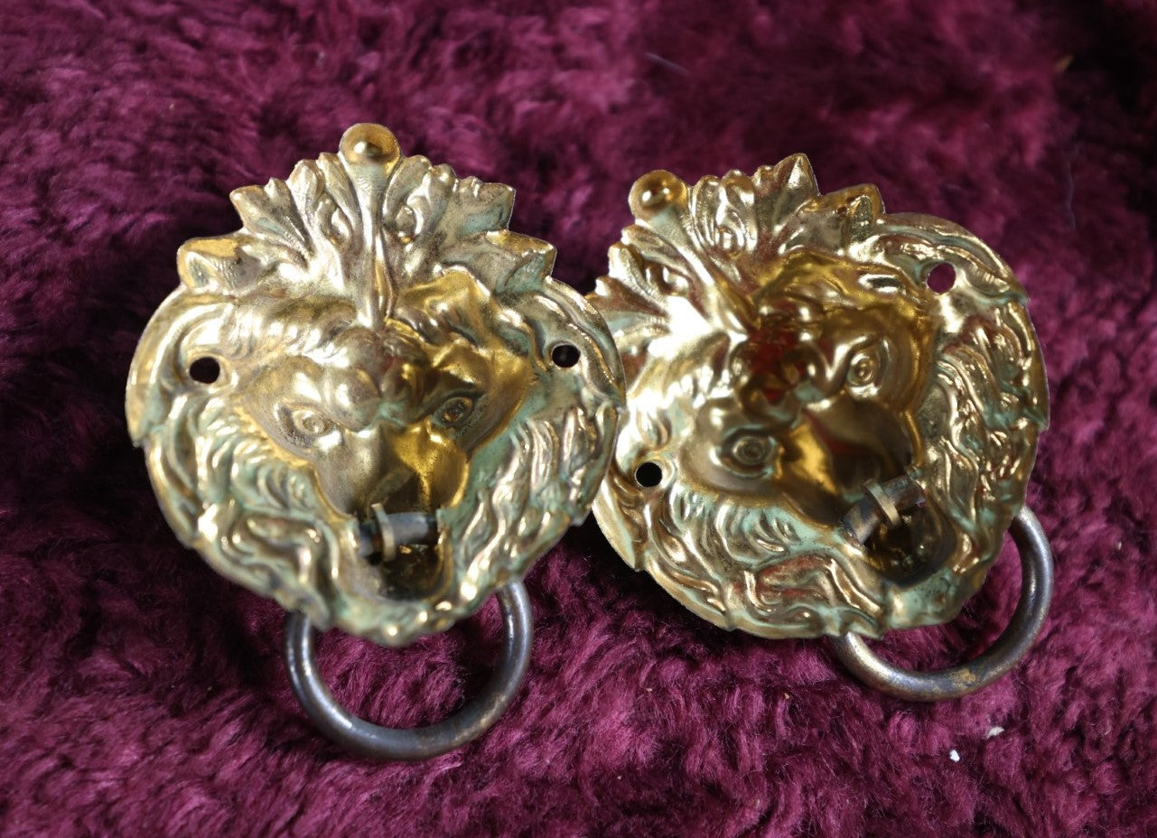 Lot 047 - Pair Of Antique Brass Tin Lion Head Drawer Pulls