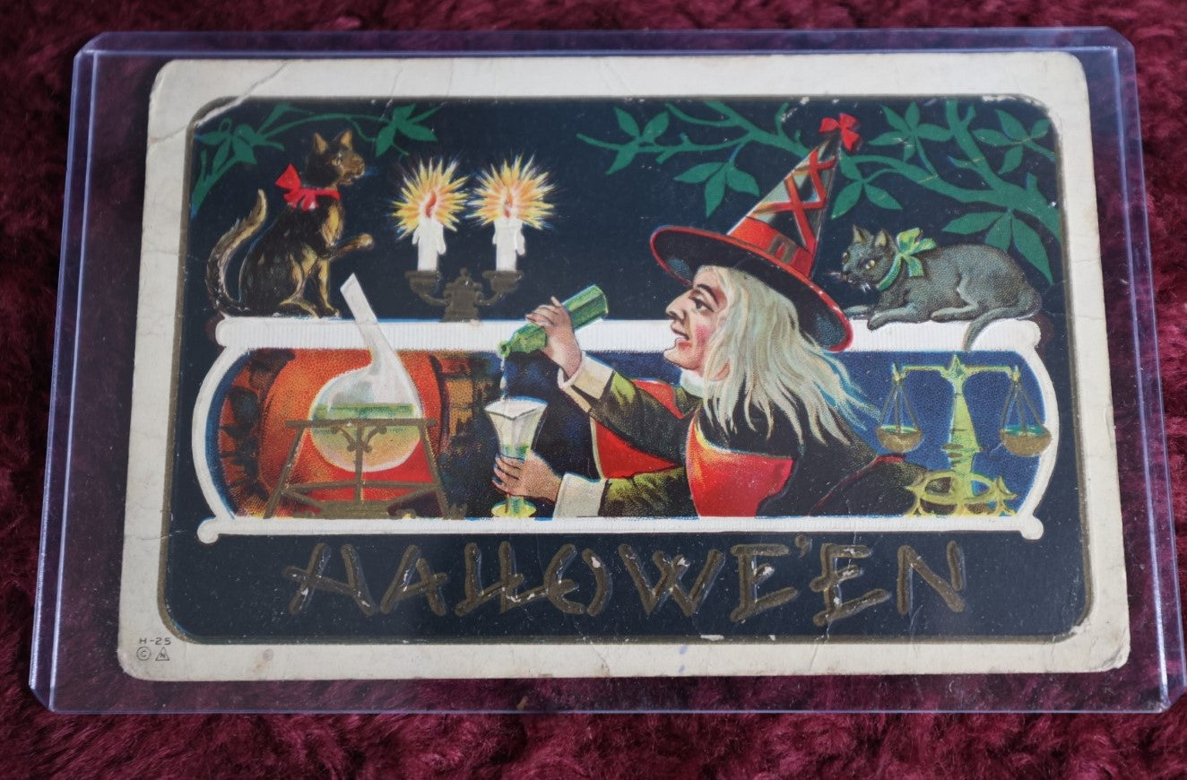 Lot 066 - Antique Halloween Postcard, H-25, Witch Mixing Potions With Cats, Candles, Note Losses, Bends, Damage