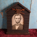 Lot 079 - Antique Print Of President Abraham Lincoln In Hand Made Log Cabin Frame With Patriotic Shield, Swords, Likely Grand Army Of The Republic Related, Note Losses To Wood