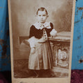 Lot 082 - Antique Cabinet Card Photo Of Young Child, Well Dressed, Against Pedestal With Carved Dog Head, Dunshee Photographer, Frankford, Pennsylvania