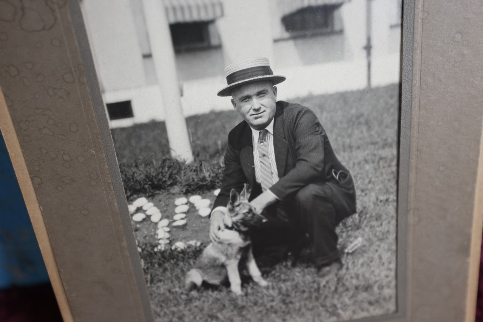 Lot 084 - Antique Boarded Photo Of Man In Hat With German Shepherd Puppy