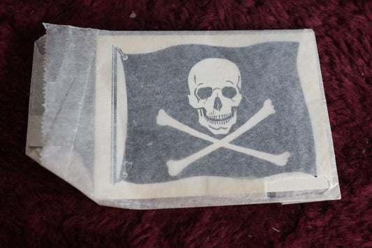 Lot 102 - Vintage Skull Jolly Roger Flag Window Or Luggage Aplique, By Baxter Lane Co., Amarillo, Texas