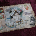 Lot 108 - Victorian Cloth Scrapbook With Many Scraps, Trade Cards, Die Cuts, Calendars, And More