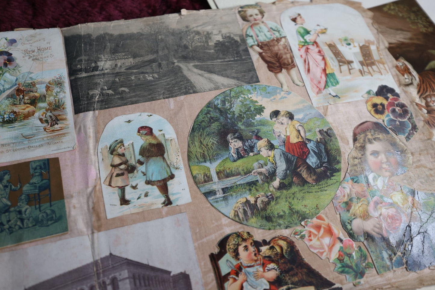 Lot 108 - Victorian Cloth Scrapbook With Many Scraps, Trade Cards, Die Cuts, Calendars, And More