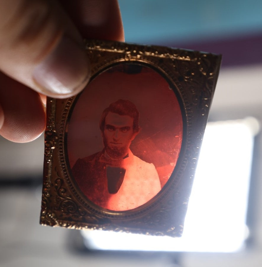 Lot 128 - Antique Ruby Ambrotype Photograph Of Dark Eyed Young Man With Beard, 1/9Th Plate