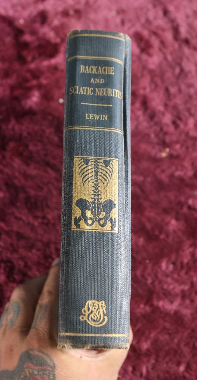 Lot 144 - Backache And Sciatic Neuritis Vintage Medical Book By Philip Lewin, M.D., Spine And Bones On Spine Of Book, 1944 Reprint