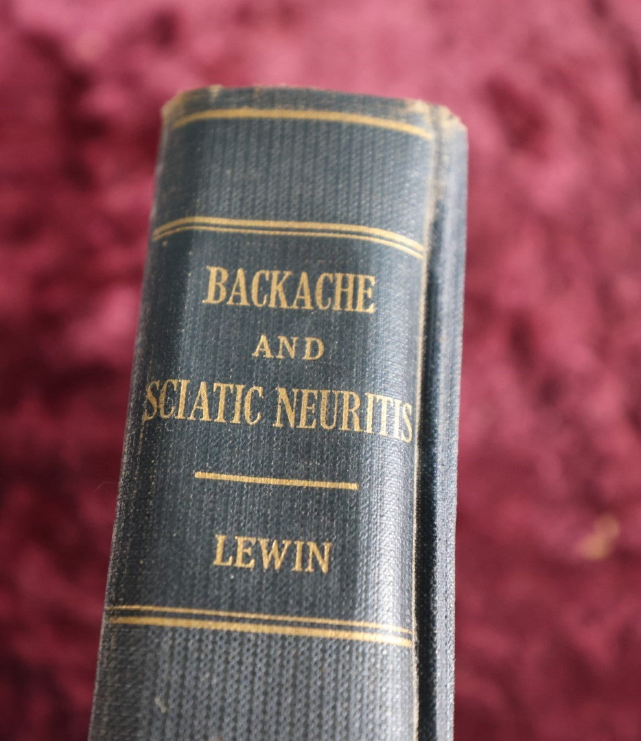 Lot 144 - Backache And Sciatic Neuritis Vintage Medical Book By Philip Lewin, M.D., Spine And Bones On Spine Of Book, 1944 Reprint