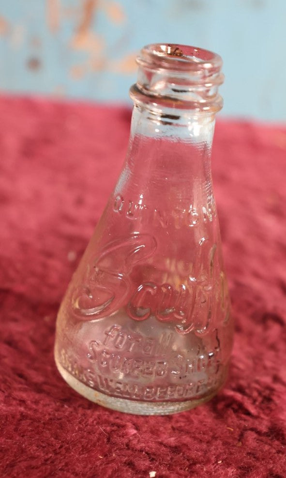 Lot 153 - Antique Scuffy Clear Glass Embossed Bottle