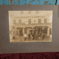 Lot 038 - Antique Boarded Photo Of C.W. Morrison Store On Main Street, Meredith, New Hampshire, "Morrison The Druggist," Many Signs And Advertisements