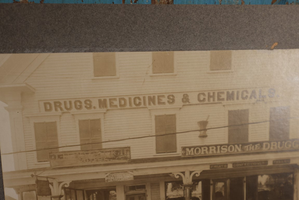 Lot 038 - Antique Boarded Photo Of C.W. Morrison Store On Main Street, Meredith, New Hampshire, "Morrison The Druggist," Many Signs And Advertisements