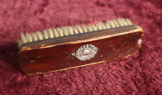 Lot 059 - Antique Wooden Dresser Brush With Sterling Silver Pendant Badge Decoration, Marked Sterling