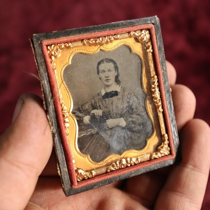 Lot 061 - Antique 1/9th Plate Tintype Of Woman Holding Object, In Full Leatherette Union Case, Separated Cover