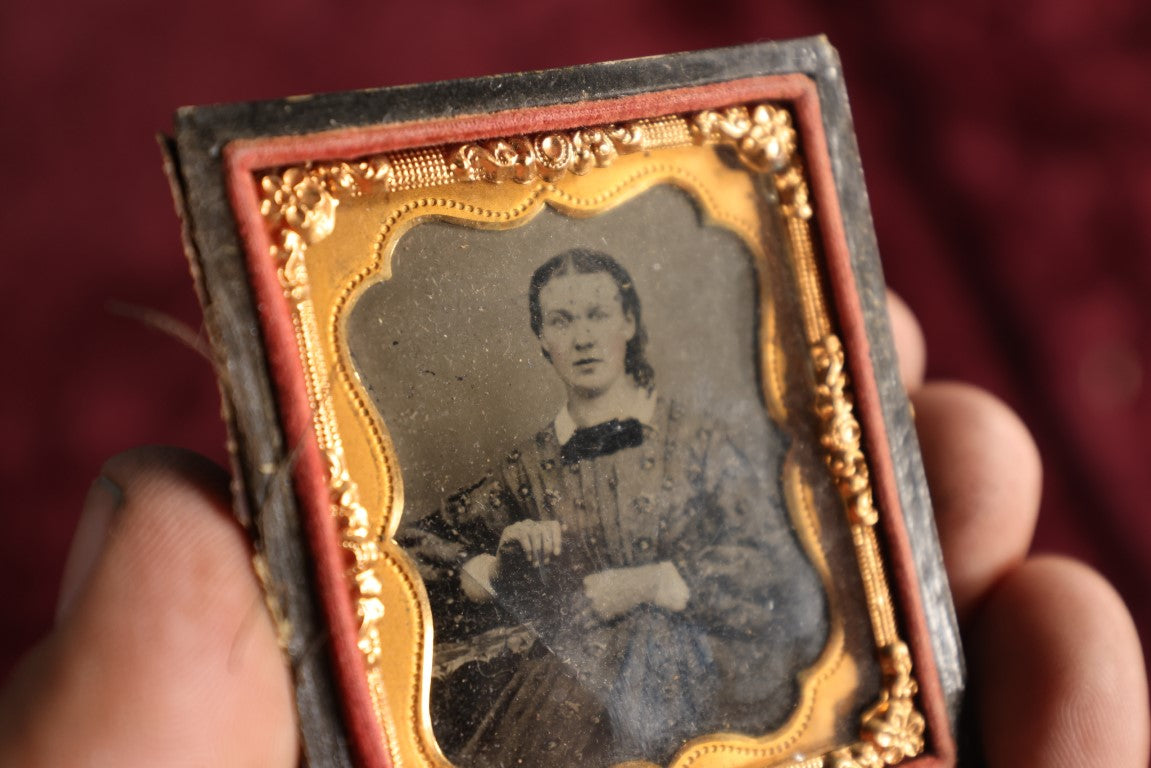 Lot 061 - Antique 1/9th Plate Tintype Of Woman Holding Object, In Full Leatherette Union Case, Separated Cover