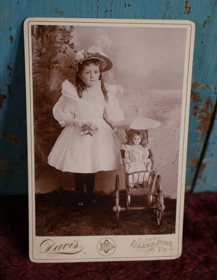 Lot 072 - Antique Cabinet Card Photo Of Young Girl With Doll In Pram, Davis Photographer, Island Pond, Vermont