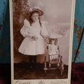 Lot 072 - Antique Cabinet Card Photo Of Young Girl With Doll In Pram, Davis Photographer, Island Pond, Vermont